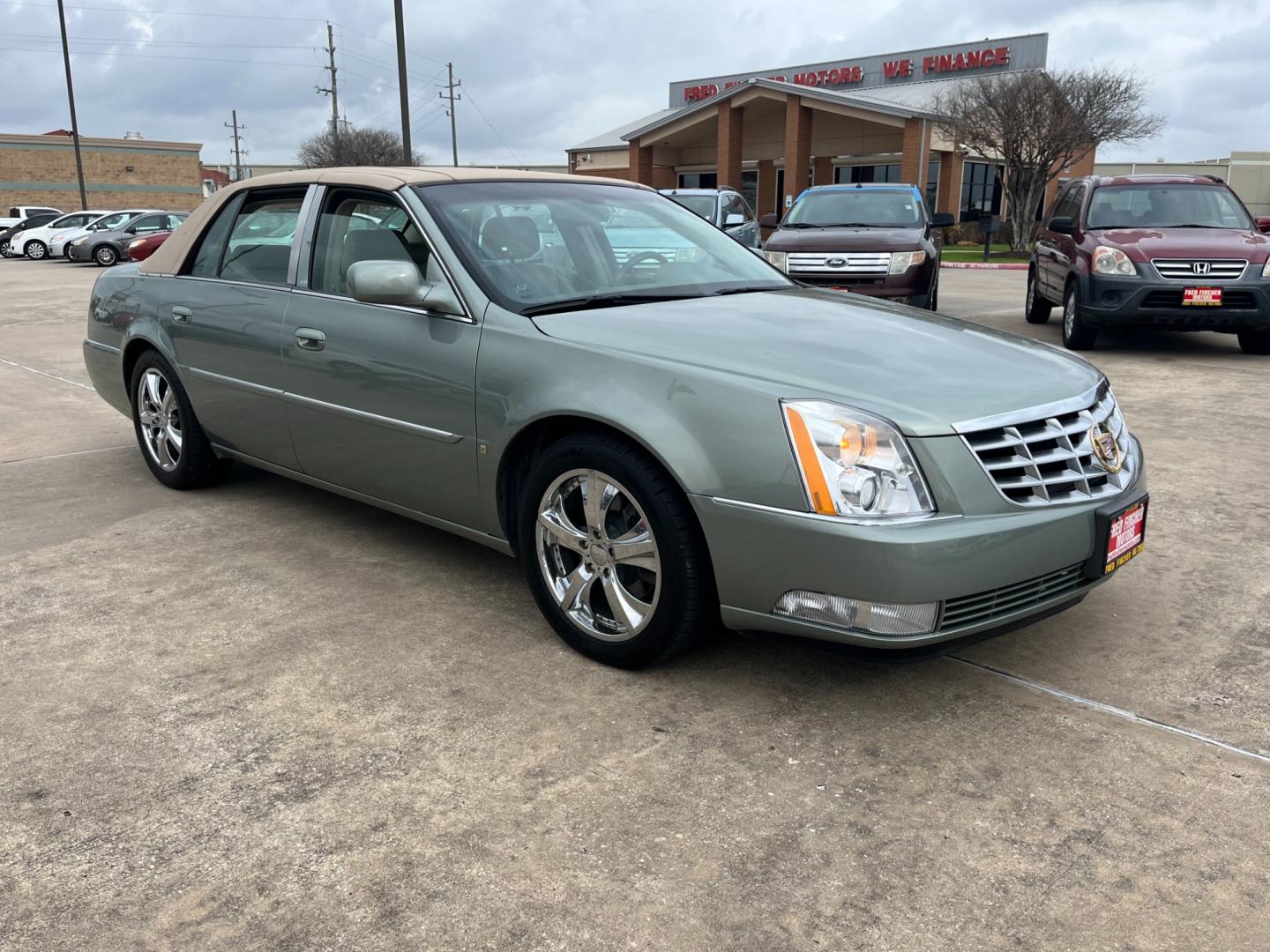 2006 green /TAN Cadillac DTS Sedan (1G6KD57Y96U) with an 4.6L V8 DOHC 32V engine, 4-Speed Automatic Overdrive transmission, located at 14700 Tomball Parkway 249, Houston, TX, 77086, (281) 444-2200, 29.928619, -95.504074 - Photo#0